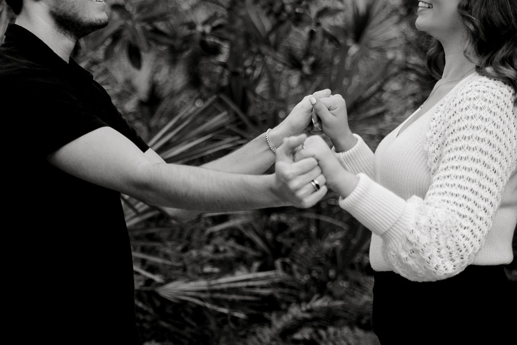 Destination wedding photographer captures couple holding hands