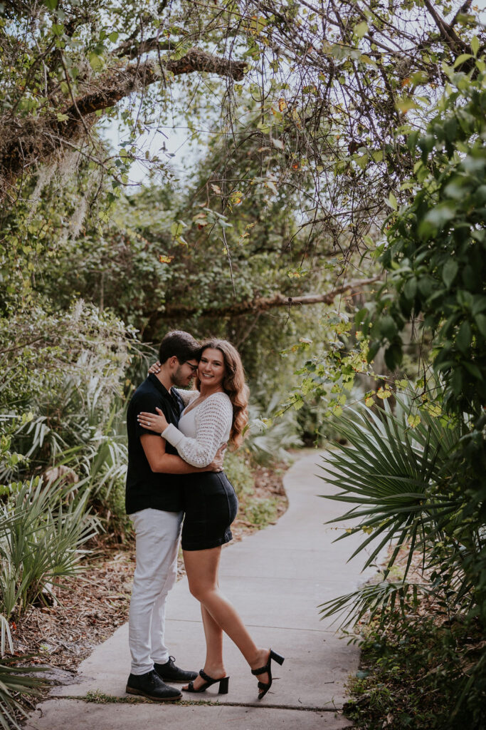 Destination Wedding Photographer captures couple embracing and hugging before Florida destination wedding