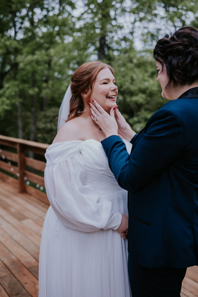 Nashville Elopement Photographer captures bride holding bride's face before intimate Bridgerton wedding