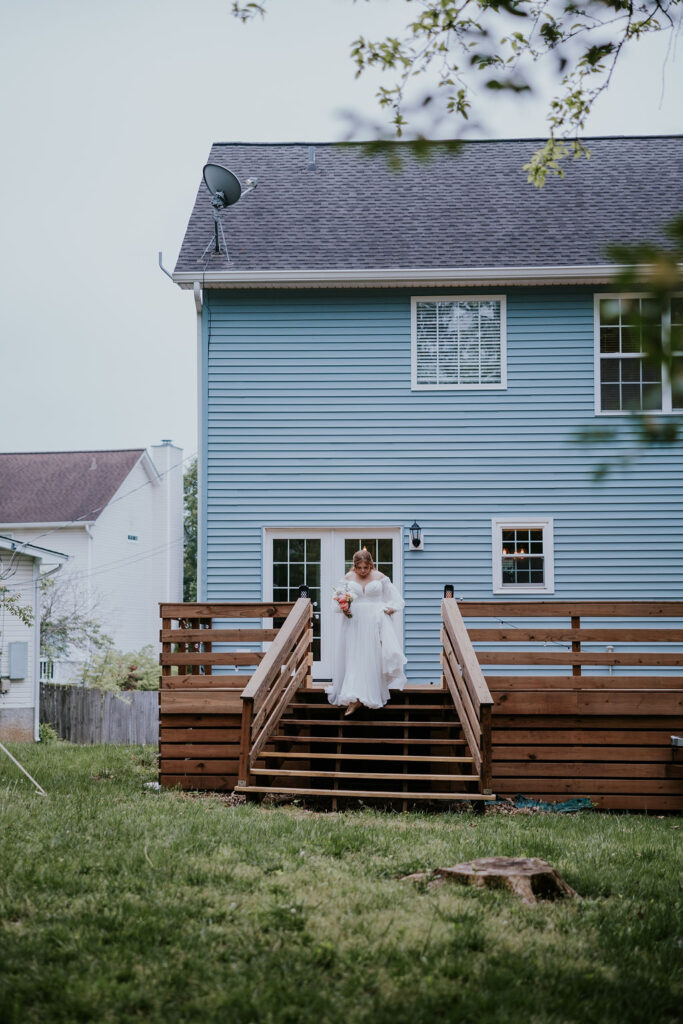 Nashville Elopement Photographer captures bride walking down stairs to the alter