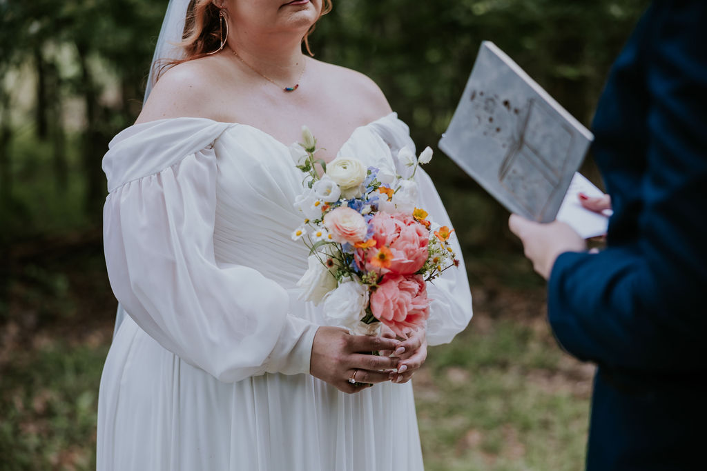 Nashville Elopement Photographer captures bride reading vows to other bride