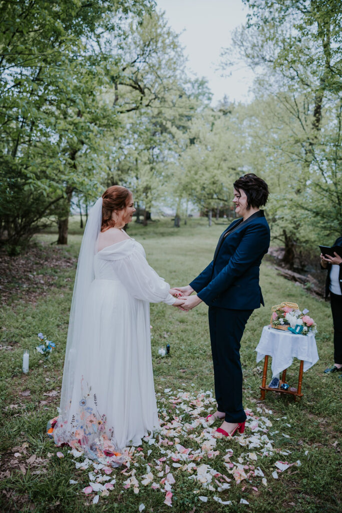 Nashville Elopement Photographer captures couple holding hands after Bridgerton wedding ceremony