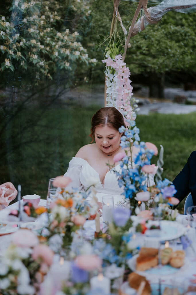 Nashville Elopement Photographer captures bride laughing during Bridgerton wedding reception