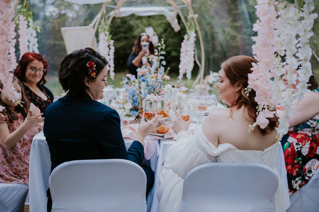 Nashville Elopement Photographer captures couple toasting during wedding reception