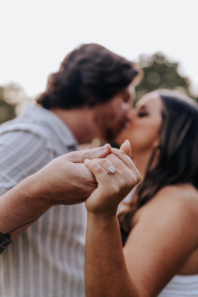 Nashville elopement photographer captures couple holding hands and kissing