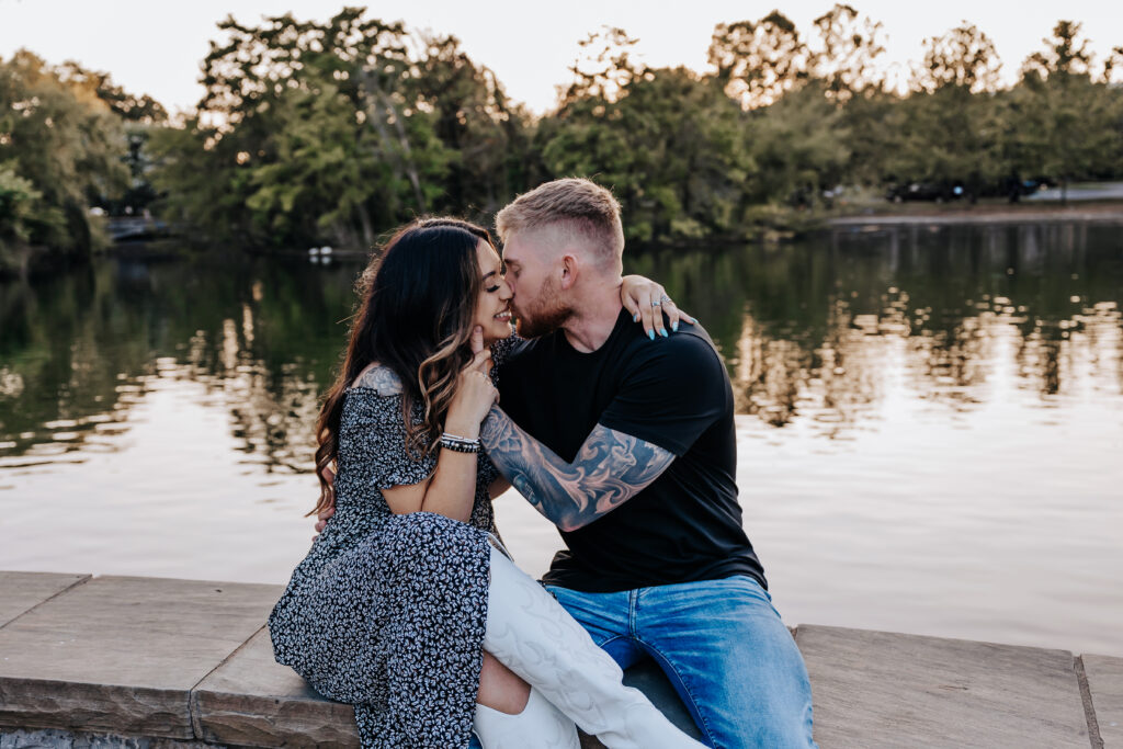 Nashville elopement photographer captures couple kissing on wall