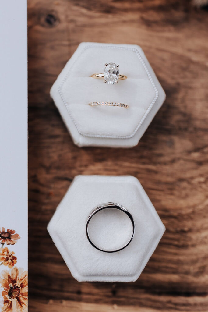 Destination Wedding Photographer captures wedding rings in ring box before wedding ceremony