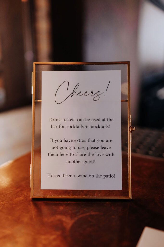 Destination wedding photographer captures sign at reception