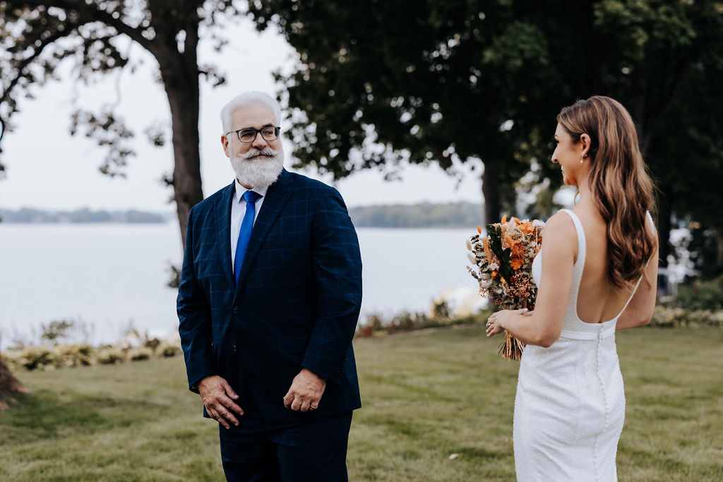 Destination wedding photographer captures first look with bride and her father