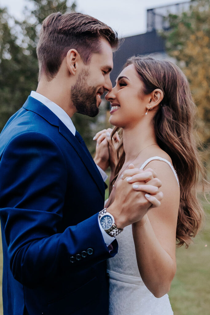 Destination wedding photographer captures bride and groom smiling at each other