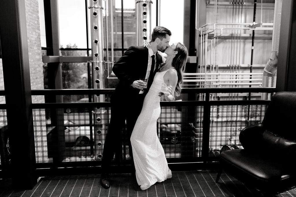 Destination Wedding Photographer captures bride and groom kissing before evening reception