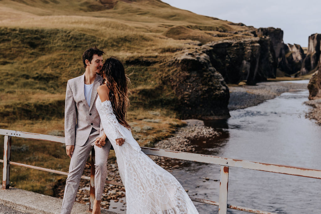 Destination Wedding Photographer captures Iceland wedding dresses blowing in wind