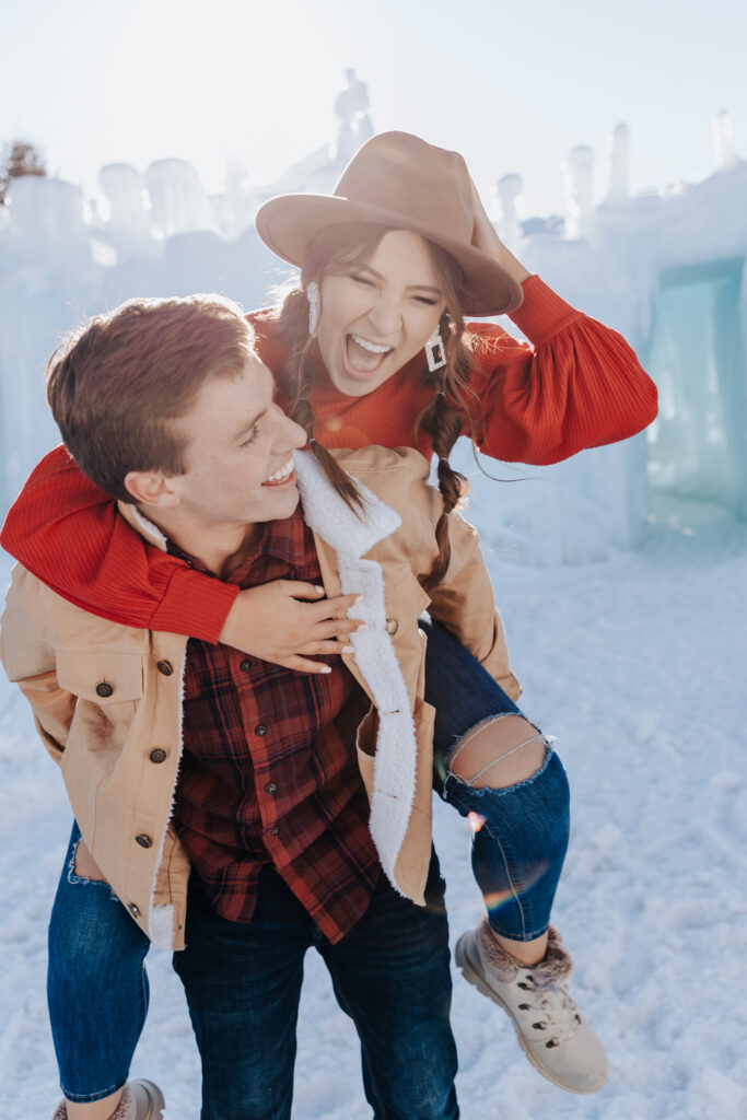 Destination Wedding Photographer captures woman riding on man's back