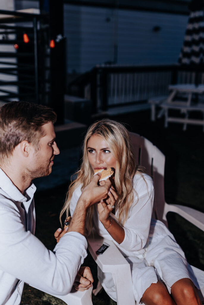 Nashville Engagement Photographer captures man feed woman smores during date night