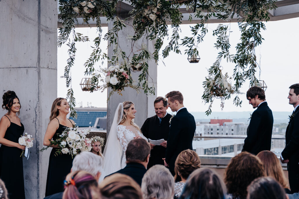 Destination Wedding Photographer captures bride and groom at the kimpton Aertson during outdoor wedding ceremony