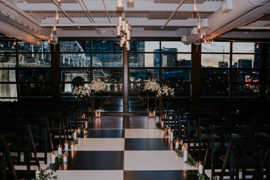 Destination Wedding Photographer captures black and white checkboard floor with chairs at The Bridge Building 