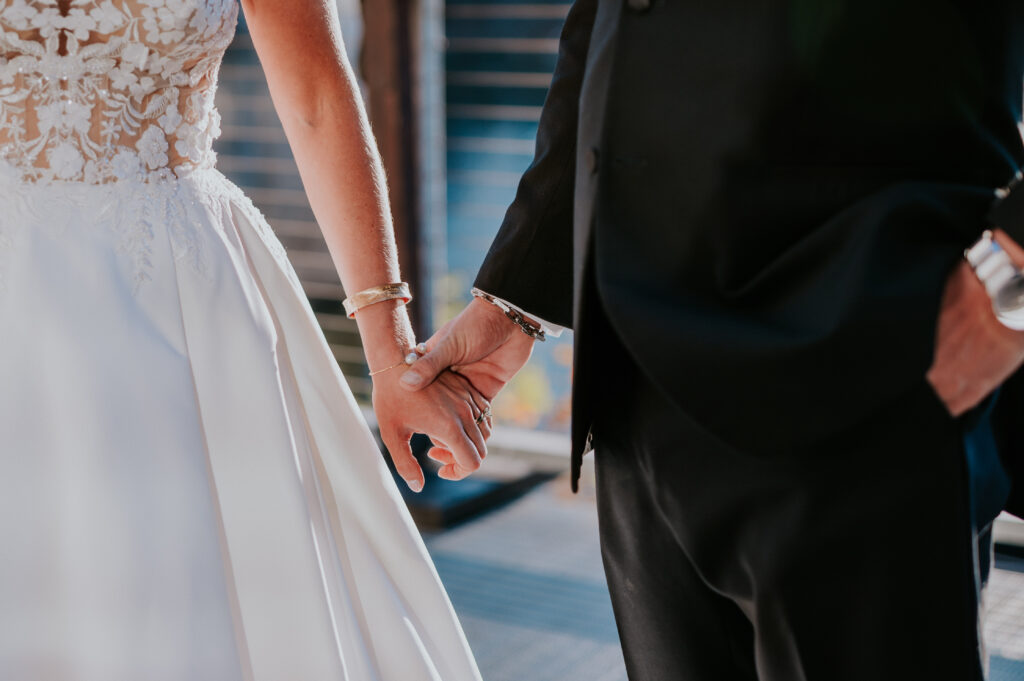 Nashville Wedding Photographer captures bride and groom holding hands after first look