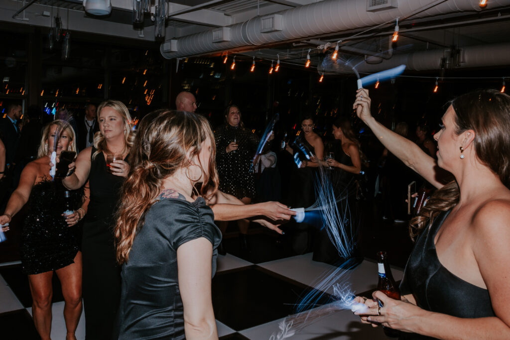 Nashville Wedding Photographer captures guests dancing after Bridge Building wedding
